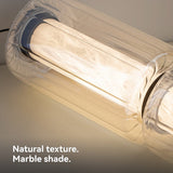 Close view of the marble glowing through the clear glass sleeve