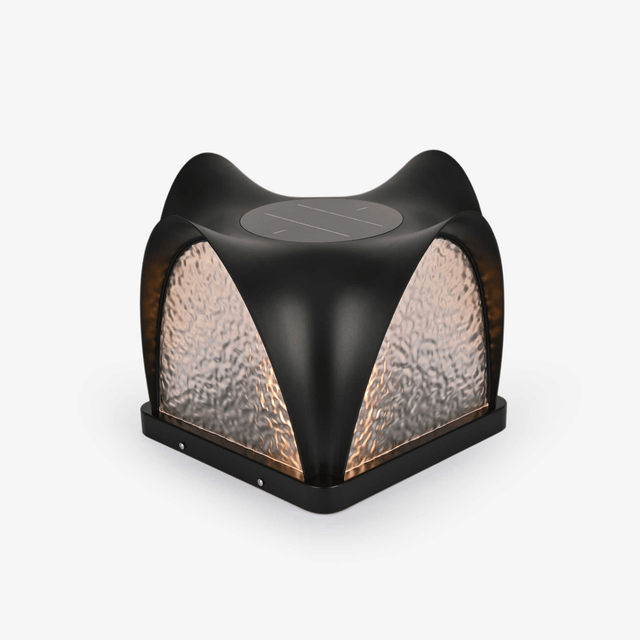 Sculpted cap with four curved petals over textured lit panels