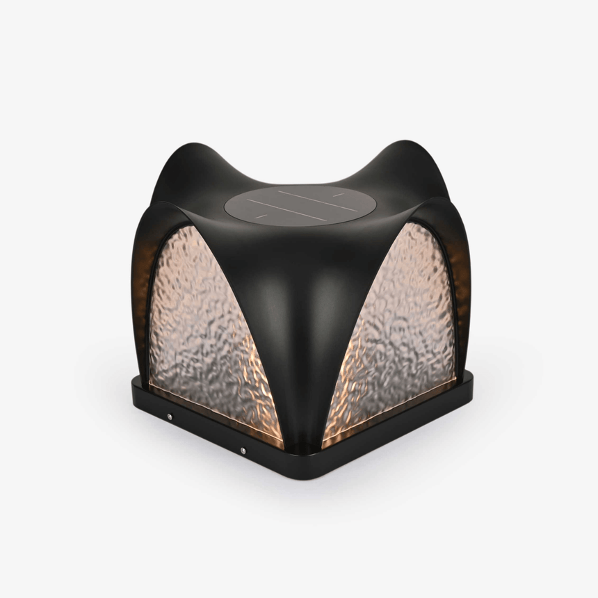 Sculpted cap with four curved petals over textured lit panels