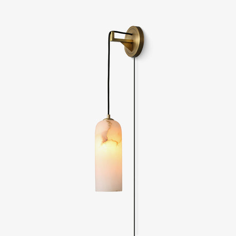 Hanging stone cylinder wall lamp on a brass bracket with a braided cord