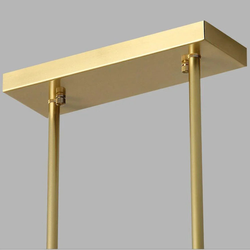 Close view of the brass frame corner where two arms meet