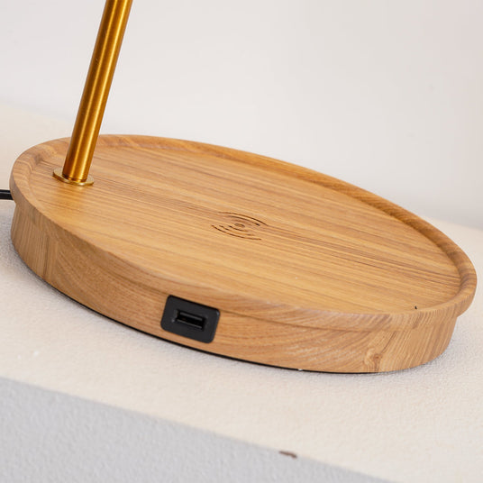 Close view of the oval ash base showing the port set in its edge
