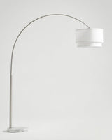 Tall satin nickel arc floor lamp with a two tier white linen shade