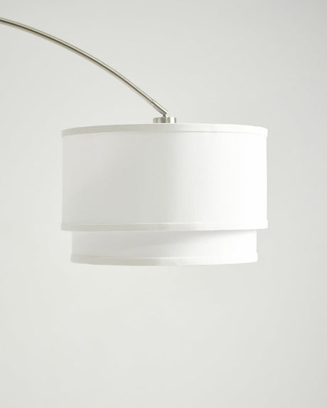 The white two tier linen drum seen close, the lower tier stepped in