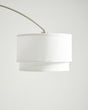 The white two tier linen drum seen close, the lower tier stepped in