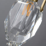 Close view of the faceted crystal with a filament bulb inside
