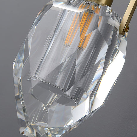 Close view of the faceted crystal with a filament bulb inside