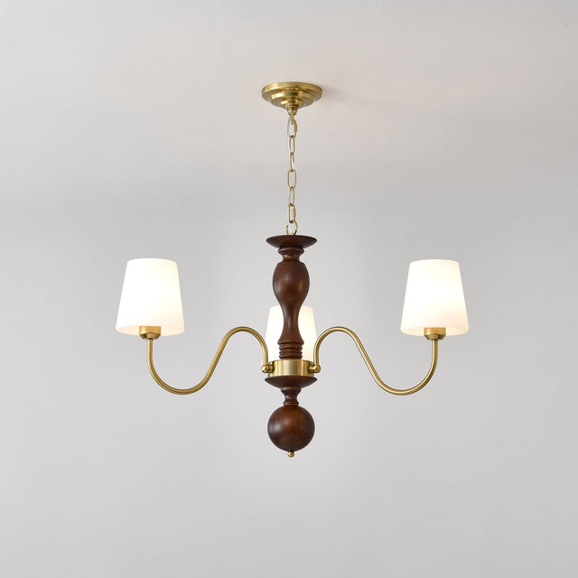 Three light chandelier with white fabric cones on a walnut column