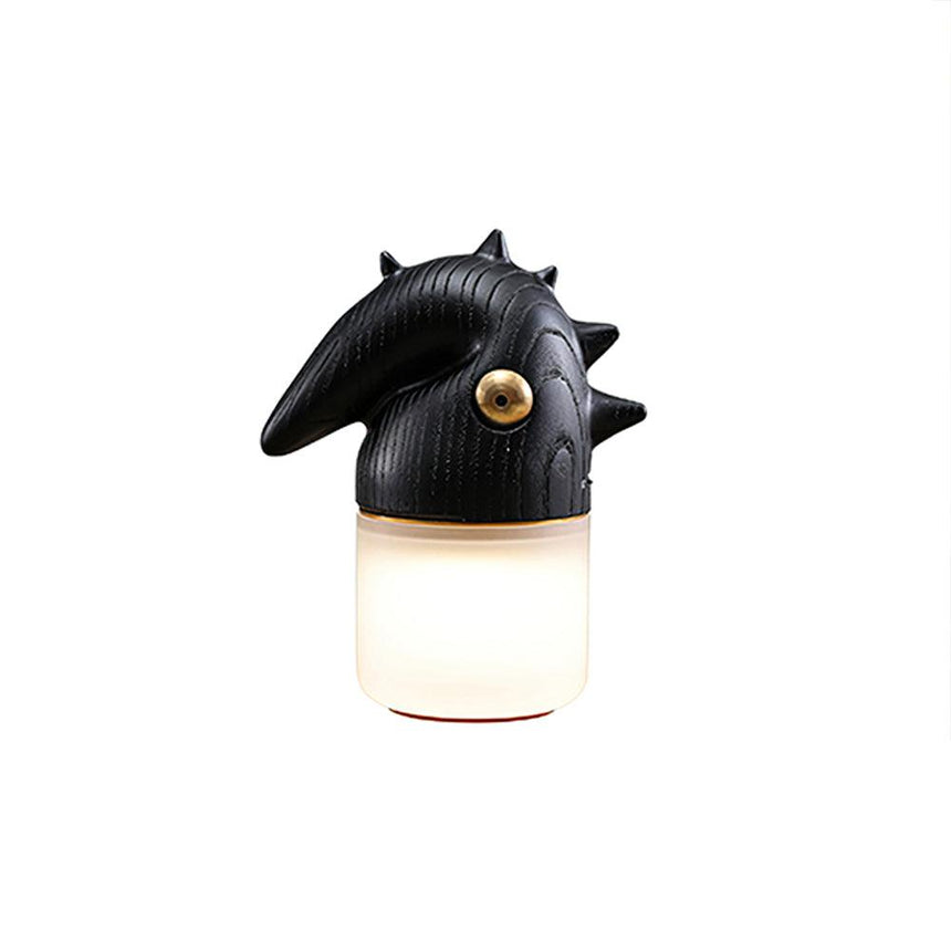 Touch control bedside lamp in black, lit, front view