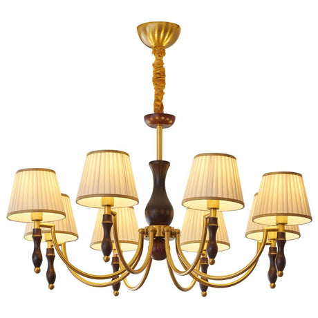 The eight light build lit warm with pleated shades all round