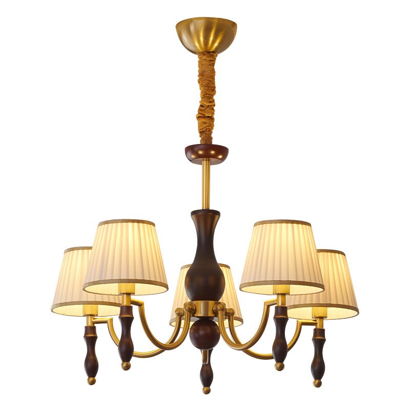 The five light build, arms fanned around the tapered walnut column