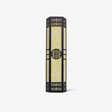 Three quarter view of the column, its angled faces and the fretwork at each end