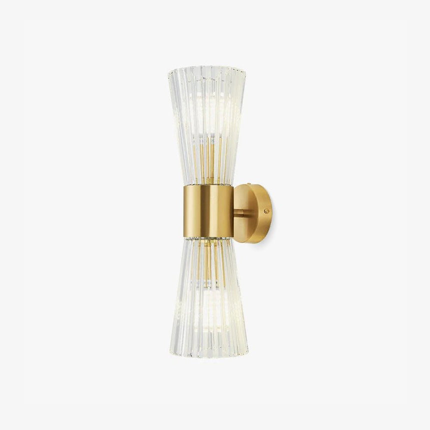 Wall sconce with a gold cylinder between two flared shades of ribbed clear glass