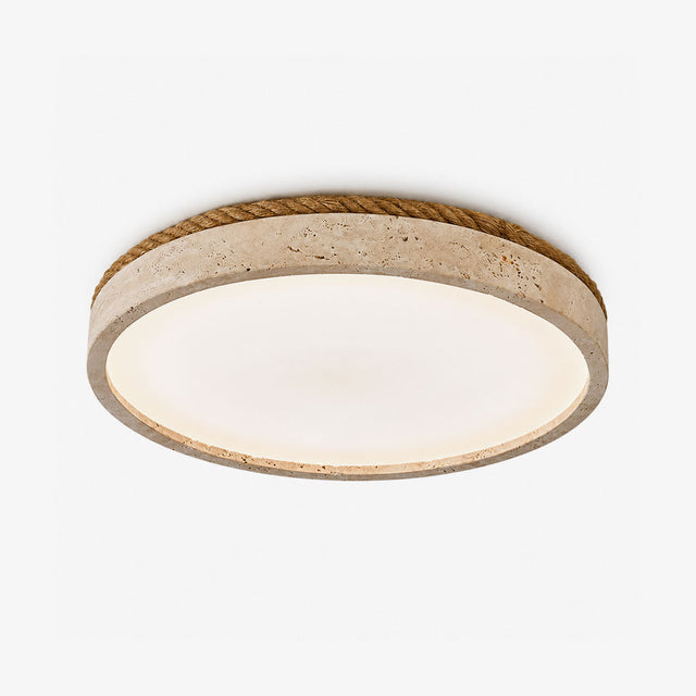 Travertine flush mount ceiling light with a round stone rim and a white panel