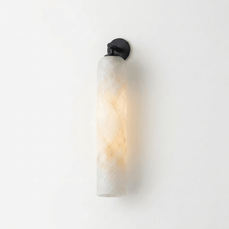 The matte black version with its stone column on a white background