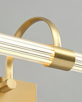 Close view of the ribbed clear tube where the brass arch grips it
