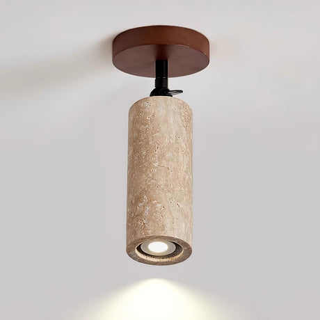 The same travertine tube mounted on a ceiling and aimed straight down