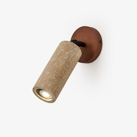 Tube wall sconce in travertine on a round walnut base, mounted on a wall