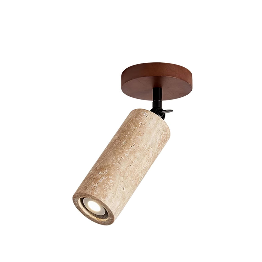 Travertine tube on a walnut plate seen against a plain white background