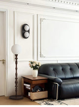 Wall sconce in glass and wood