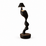 Cordless table lamp in matte black seen from the front, plain background