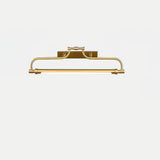 The gold version seen straight on, an arched bracket over a slim lit tube