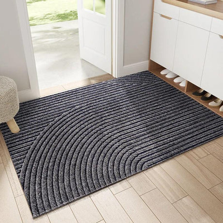 SureHold Non-Slip Door Mat capturing mud and debris - OpalDwell