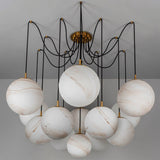 The globes unlit on black arms, veining visible in each alabaster sphere
