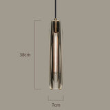 The pendant drawn with its 7 cm width and 38 cm height marked