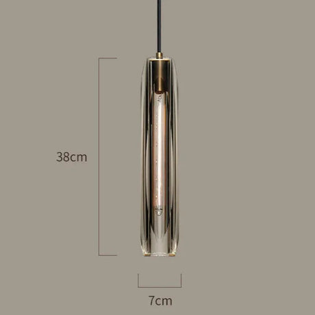 The pendant drawn with its 7 cm width and 38 cm height marked