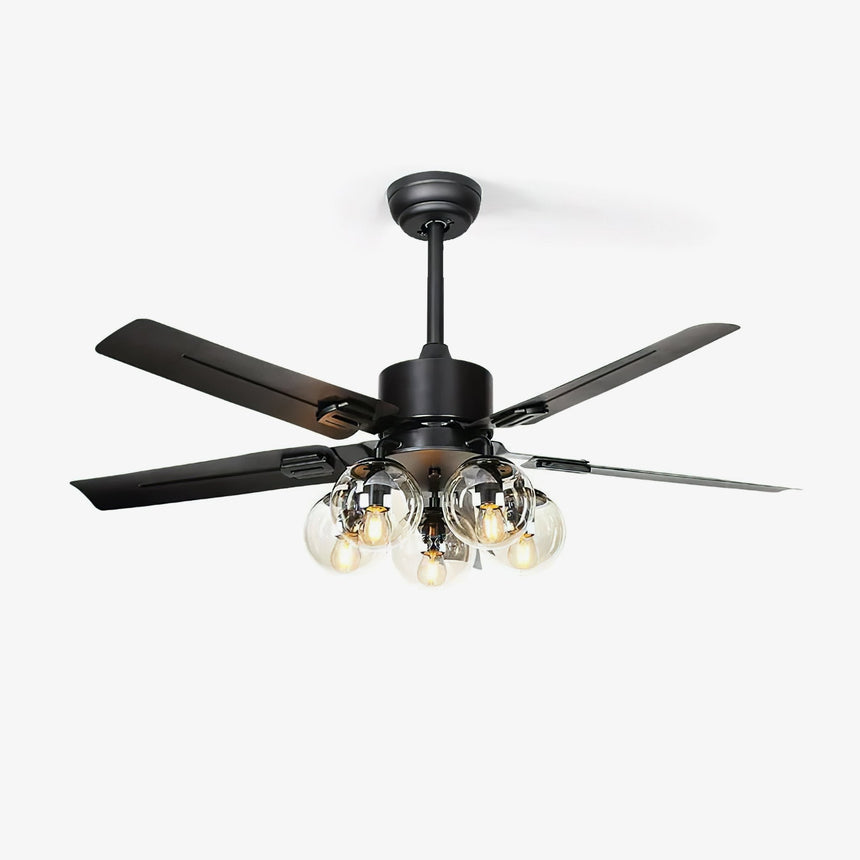 Vintage ceiling fan with light, black blades over a cluster of glass globes