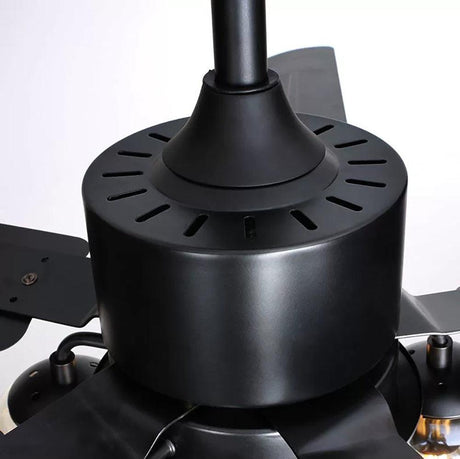 Close view of the black motor housing of the ceiling fan