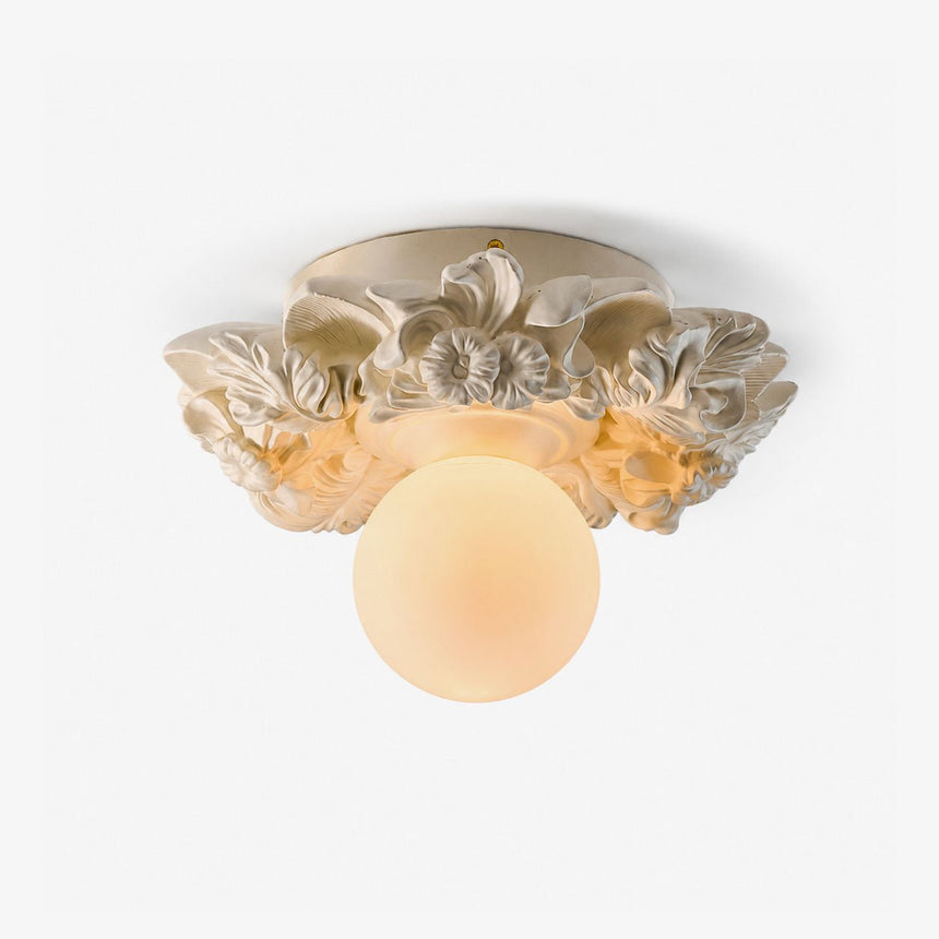 Vintage flush mount ceiling light with a hand carved floral shade and an opal globe