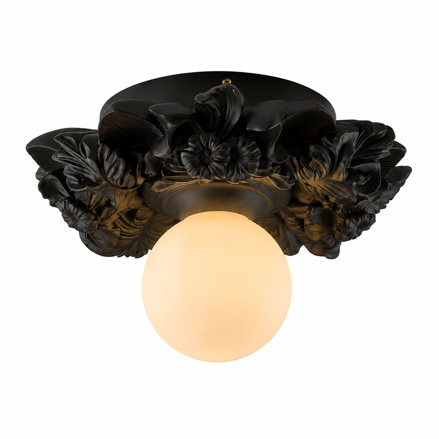 Matte black carved floral ceiling light with a white opal globe