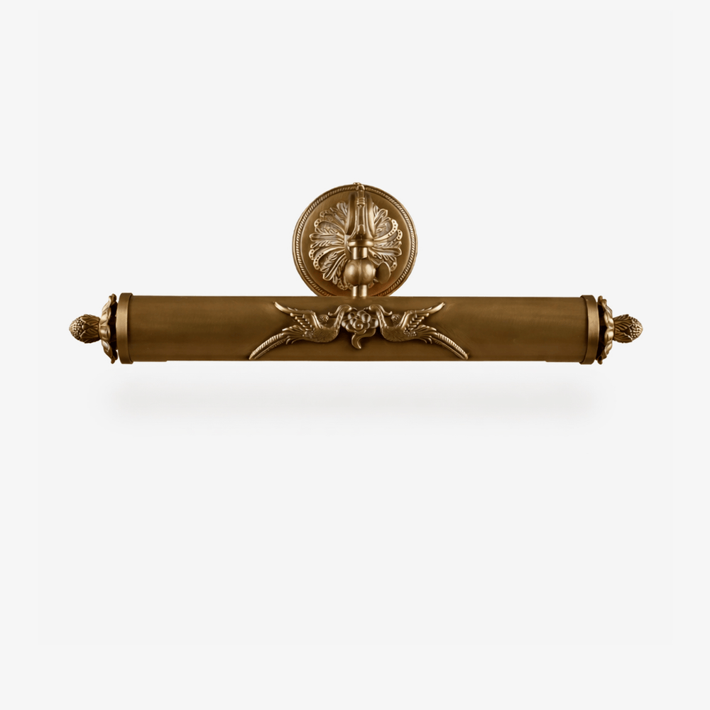 Scrolled brass bar with a cast round backplate and turned finials