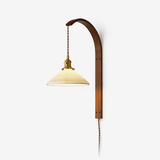 Vintage wall lamp, a curved wood hook arm with a ribbed white glass shade