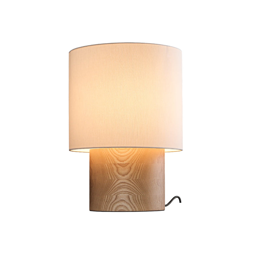 Wabi sabi table lamp in light wood seen from the front, plain ground