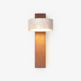 Wall lamp for reading, a travertine drum head on a walnut bar with a pull cord