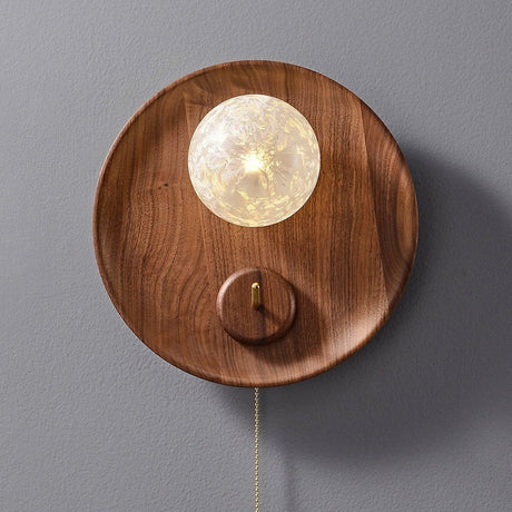 Close view of the lit globe, its crackled surface breaking up the light