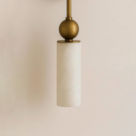Close view of the brass ball and the top of the stone tube