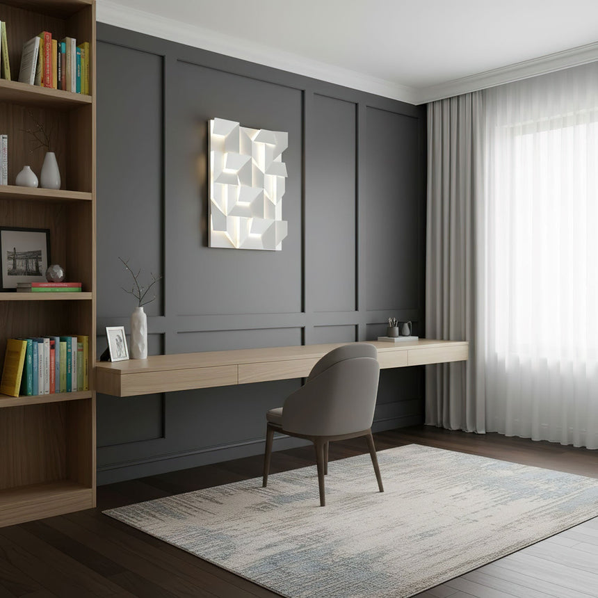 Lit above a long desk in a study lined with dark wood paneling and open shelving