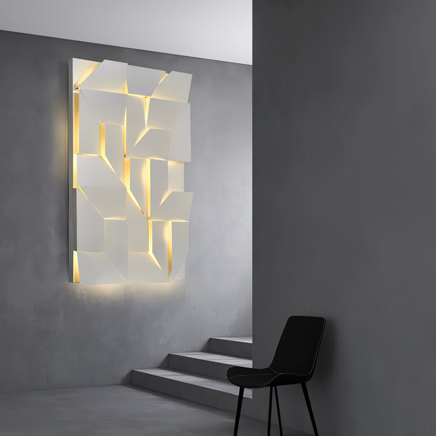 Lit beside a flight of pale stairs against a gray wall with a single chair