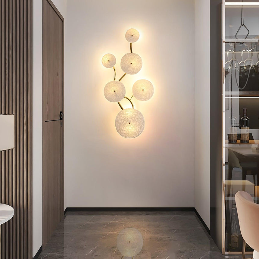 The vertical disc light glowing at the end of a narrow hallway