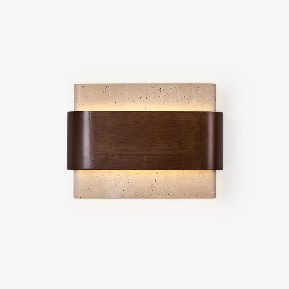 Wall sconce above bed, a travertine block wrapped by a walnut band