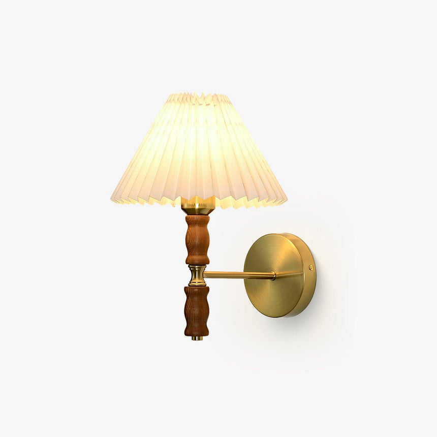 Wall sconce with a pleated fabric shade on a turned walnut column