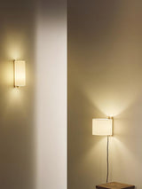 Wall sconce with a linen shade