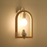 The bird lit against a warm ochre wall, the globe bright above it