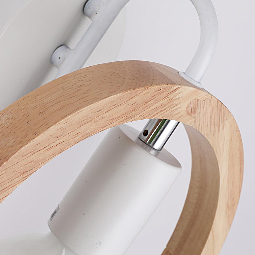 Close view of the oak arch where it meets the white socket collar