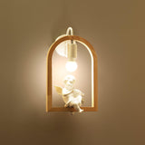 The winged figure lit against a warm ochre wall inside the oak arch