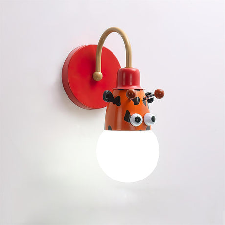 The red tiger lamp lit, its orange face and red wall plate
